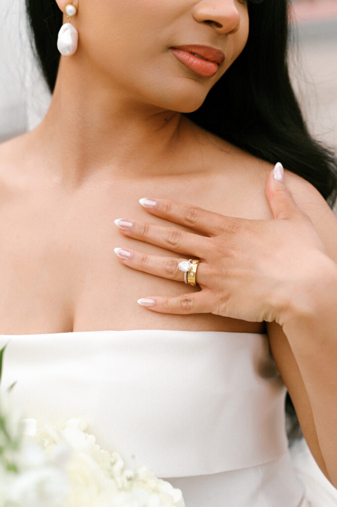 Close up details of the bride wearing her beautiful jewelry, photographed by Chelsea Schmidt Photography.